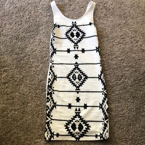 White dress with Indian like print in black